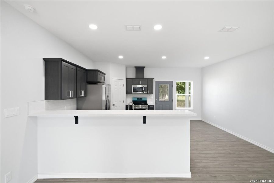 Furnished interior view inside a new home in , Beeville (Image 8).