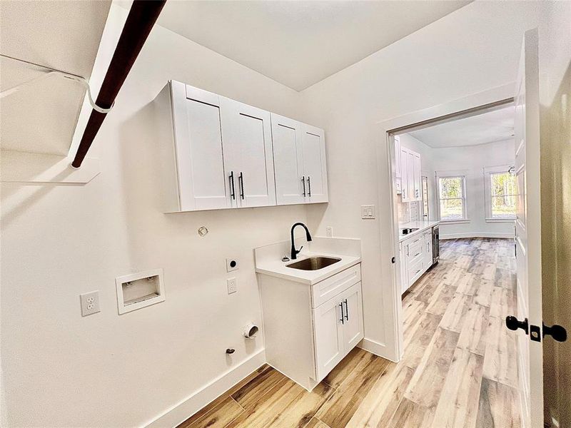 Laundry Room also comes with a Pre-Wash Sink and Dual Dryer Connections (Electric or Propane).