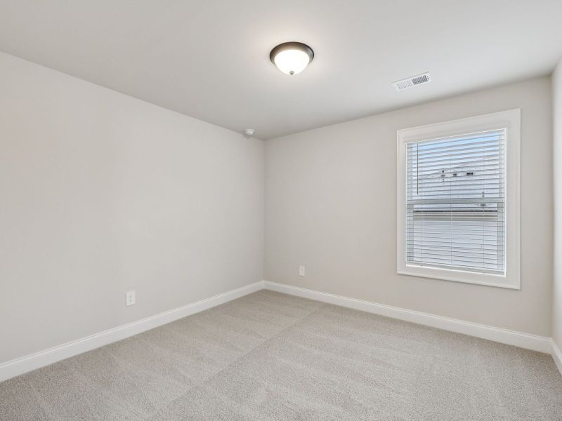 Spacious, unfurnished interior of a new home in Vines at Mill Creek - Estate Series, Braselton (Image 17).