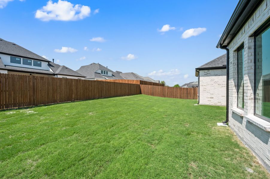 Exterior details and patio area of a home in Parks of Aledo, Aledo (Image 28).