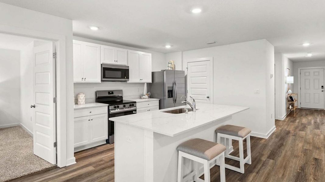 Furnished interior view inside a new home in Magnolia at the Bluffs Phase 3, Freeport (Image 7).