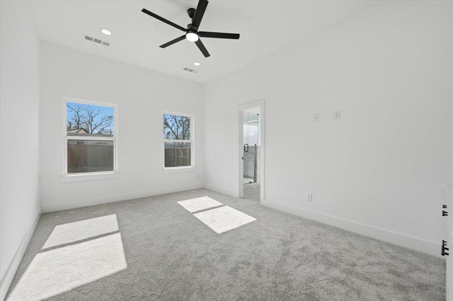 Primary suite with attached bathroom