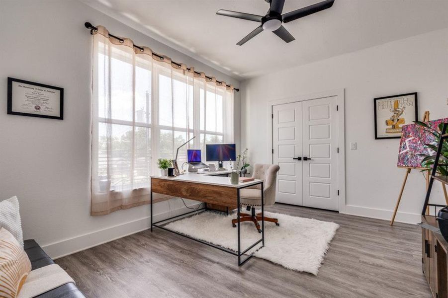 Office with ceiling fan and wood finished floors