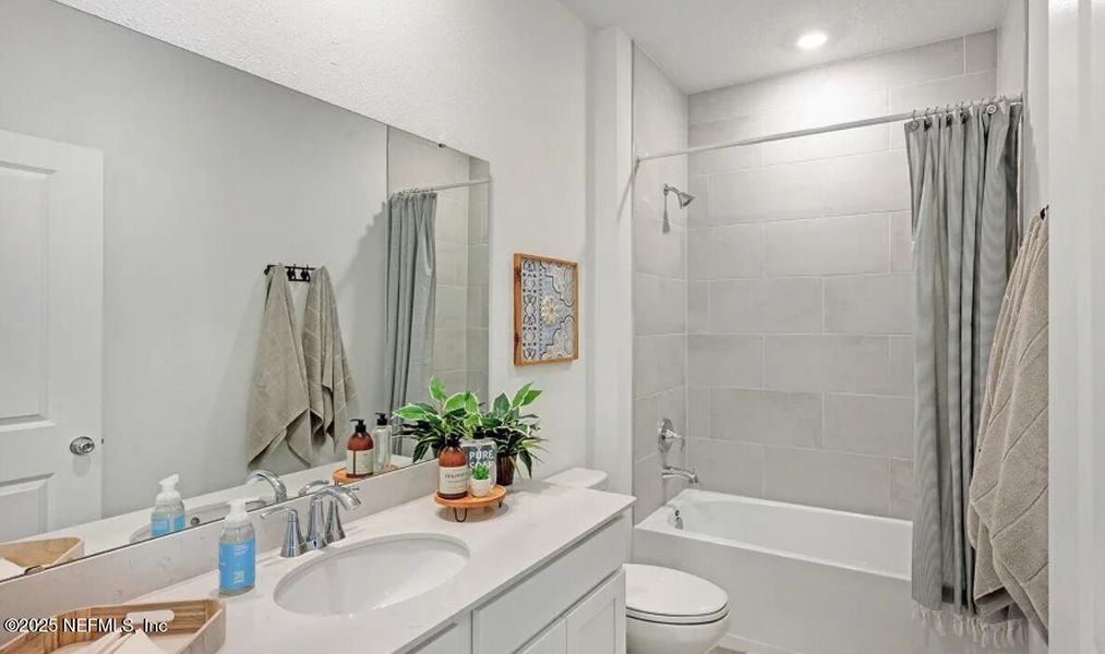 Furnished interior view inside a new home in Edenbrooke at Hyland Trail | 55+: Edenbrooke at Hyland Trail 50s, Green Cove Springs (Image 8).