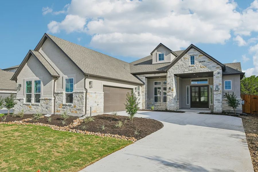 Representative exterior photo of a completed home built from the Raegan by Chesmar Homes in Sweetwater, Austin, TX (Image 2). Representative exterior photo of a completed home built from the Raegan by Chesmar Homes in Sweetwater, Austin, TX (Image 2).