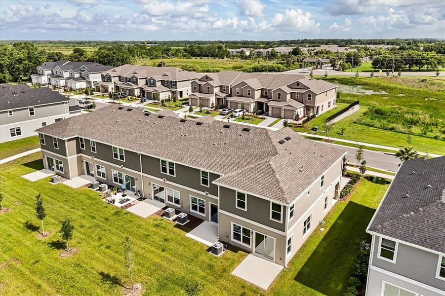 Front exterior of a new home in Reserve at Forest Lake Townhomes, Lake Wales, FL, highlighting curb appeal (Image 2). Front exterior of a new home in Reserve at Forest Lake Townhomes, Lake Wales, FL, highlighting curb appeal (Image 2).