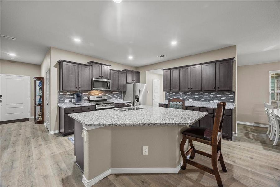 Cerner island/breakfast bar overlooks dream kitchen Cerner island/breakfast bar overlooks dream kitchen