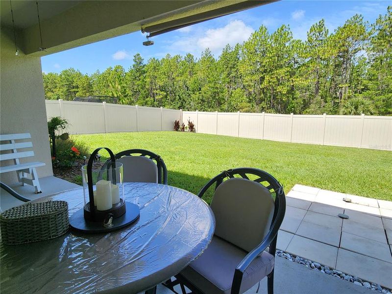Exterior details and patio area of a home in Huntington Ridge, Ocala (Image 3). Exterior details and patio area of a home in Huntington Ridge, Ocala (Image 3).