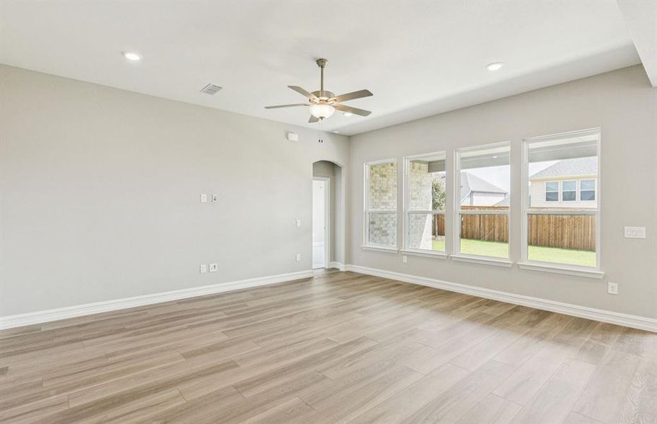 Expansive gathering room bathed in natural sunlight