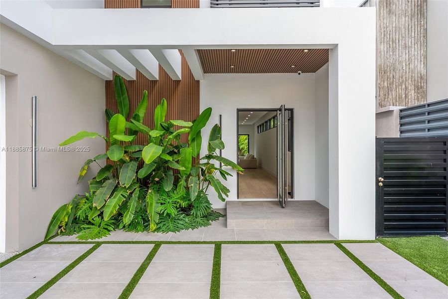 Exterior details and patio area of a home in , Miami (Image 2). Exterior details and patio area of a home in , Miami (Image 2).