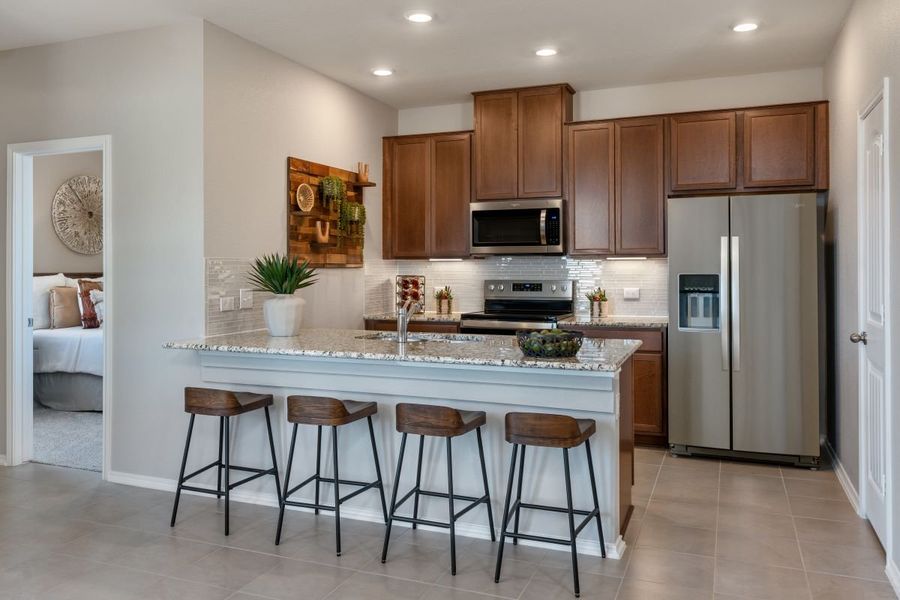 Representative furnished interior of a home built from the 1360 by KB Home in Stoney Chase, Del Valle (Image 6).