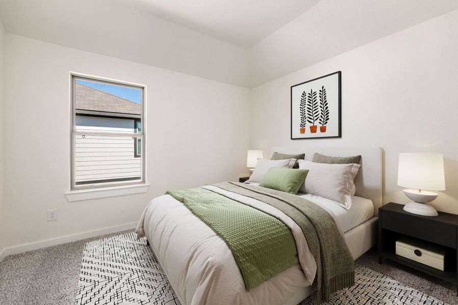 The secondary bedroom is bright with abundant natural light featuring a large window, plush carpet flooring, bright neutral color walls, recessed lighting, and an ample sized closet. *Virtually Staged The secondary bedroom is bright with abundant natural light featuring a large window, plush carpet flooring, bright neutral color walls, recessed lighting, and an ample sized closet. *Virtually Staged