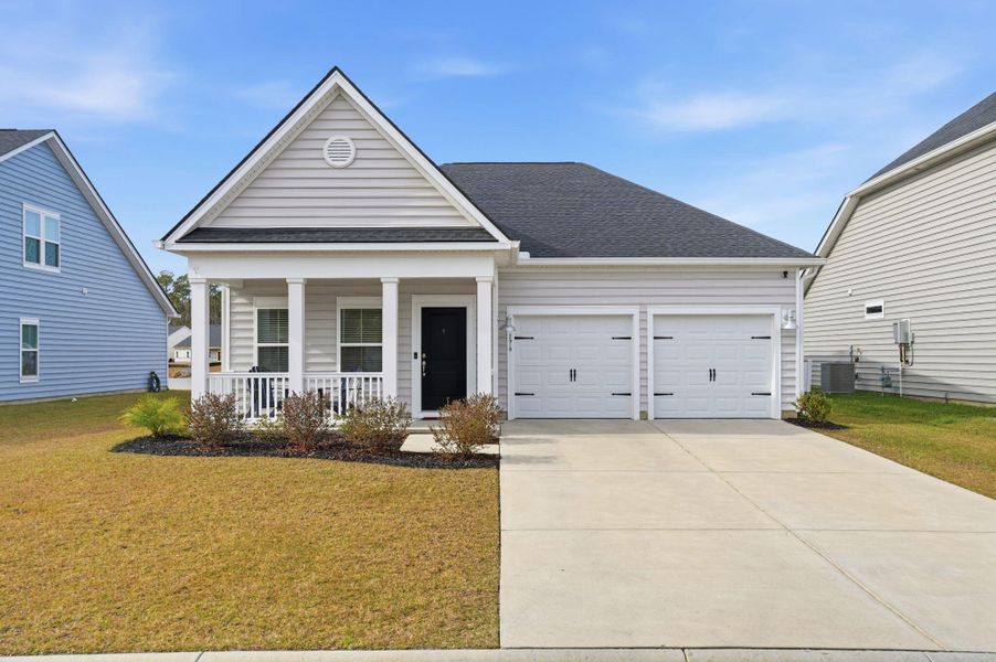 Front exterior of a new home in , Myrtle Beach, SC, highlighting curb appeal (Image 1). Front exterior of a new home in , Myrtle Beach, SC, highlighting curb appeal (Image 1).