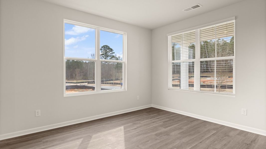 Representative unfurnished interior of a home built from the Ashmore by D.R. Horton in Brookland Commons, Monroe (Image 16).