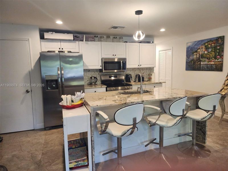 Furnished interior view inside a new home in , Delray Beach (Image 5). Furnished interior view inside a new home in , Delray Beach (Image 5).