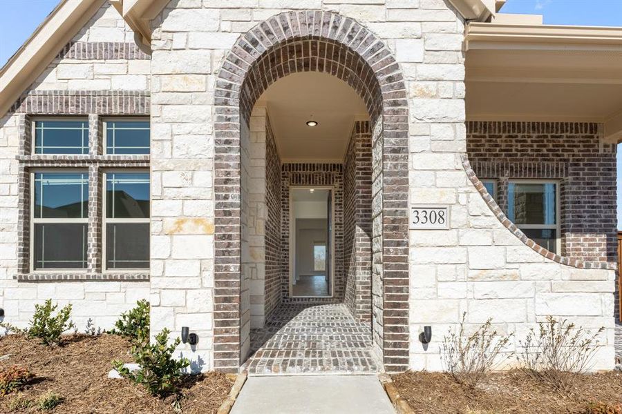Exterior details and patio area of a home in Villages of Hurricane Creek, Anna (Image 27).