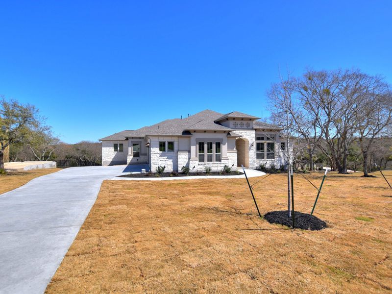 Representative exterior photo of a completed home built from the Siena III by Giddens Homes in Clearwater Ranch, Liberty Hill, TX (Image 36).
