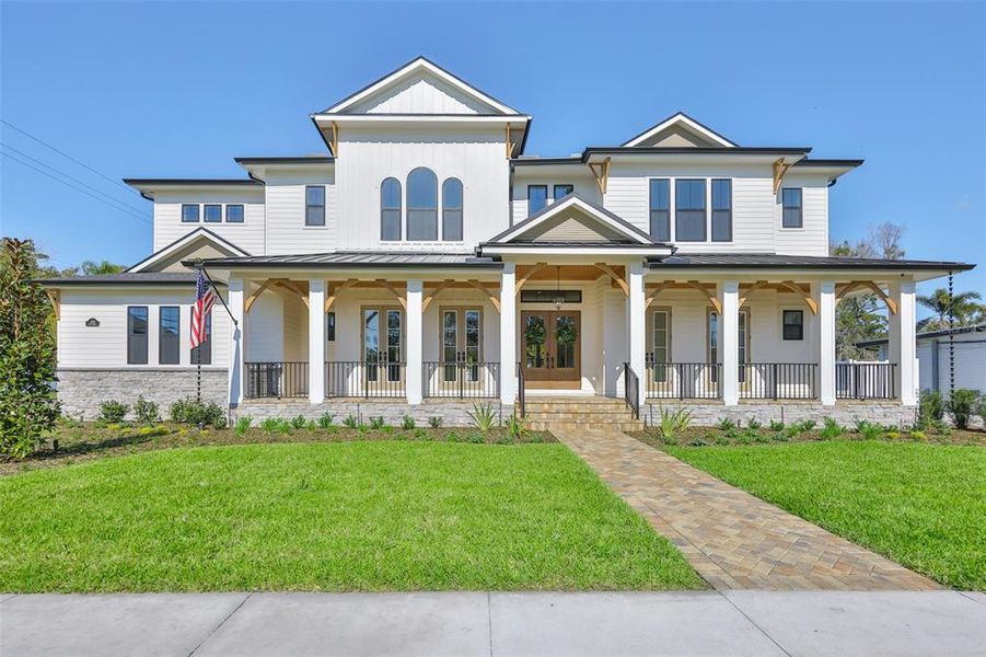 Front exterior of a new home in , Tampa, FL, highlighting curb appeal (Image 30).