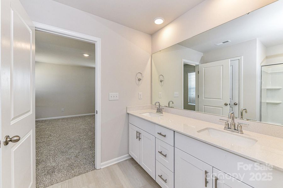 Furnished interior view inside a new home in Shepherds Landing, Mooresville (Image 8).