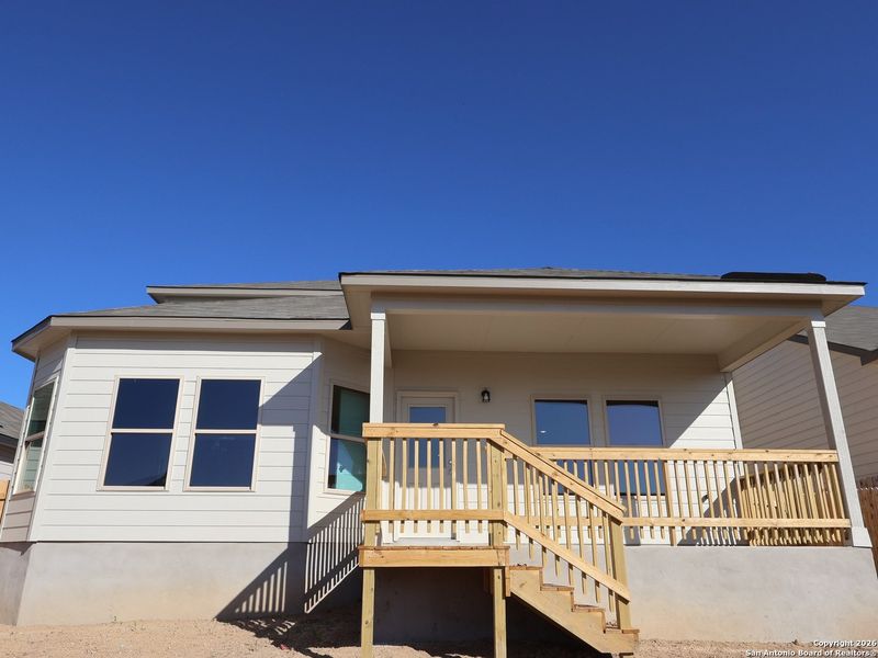 Exterior details and patio area of a home in Hunters Ranch, San Antonio (Image 4).