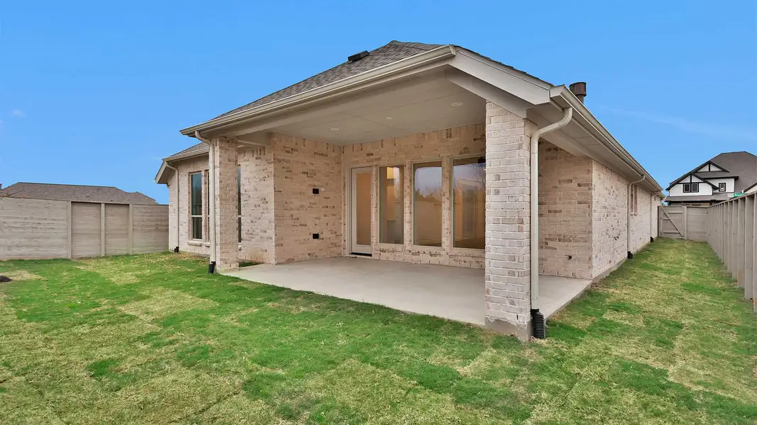 Exterior details and patio area of a home in Legacy 50', League City (Image 3).