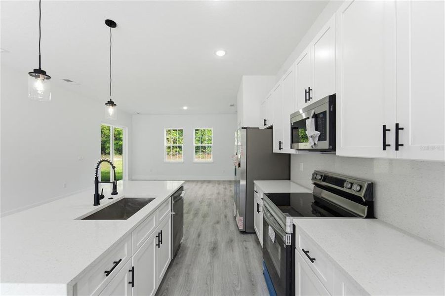 Furnished interior view inside a new home in , Dunnellon (Image 10).