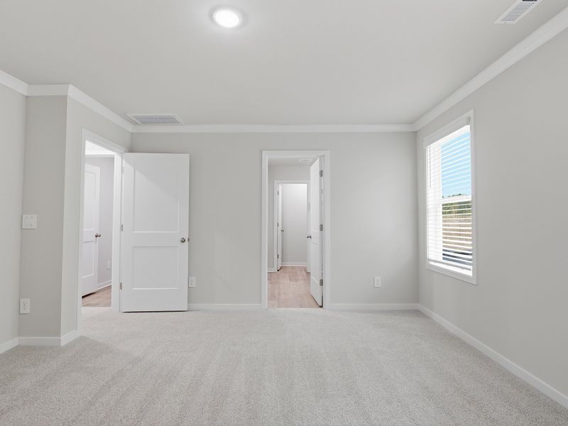 Spacious, unfurnished interior of a new home in Country Lane - Classic Series, Clayton (Image 15).