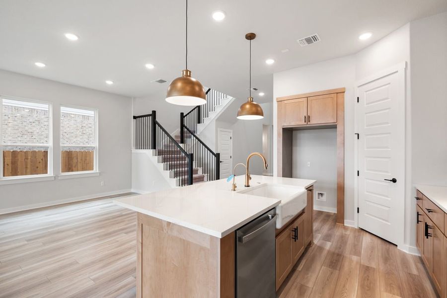 Furnished interior view inside a new home in Arbor Collection at Lariat, Liberty Hill (Image 11). Furnished interior view inside a new home in Arbor Collection at Lariat, Liberty Hill (Image 11).