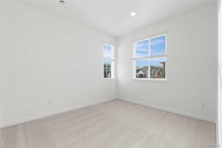 Spacious, unfurnished interior of a new home in Sterling Ranch Apex Collection, Littleton (Image 22).