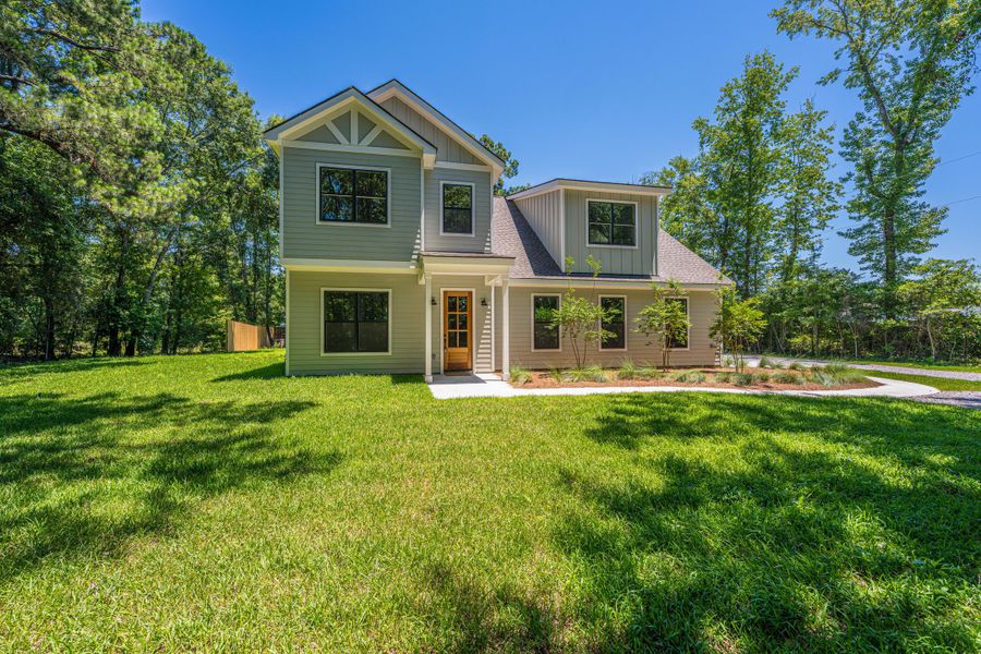 Front exterior of a new home in , Mount Pleasant, SC, highlighting curb appeal (Image 31). Front exterior of a new home in , Mount Pleasant, SC, highlighting curb appeal (Image 31).