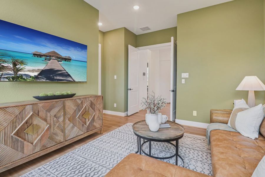 Representative furnished interior of a home built from the Lauren by Chesmar Homes in Grange, Katy (Image 13).