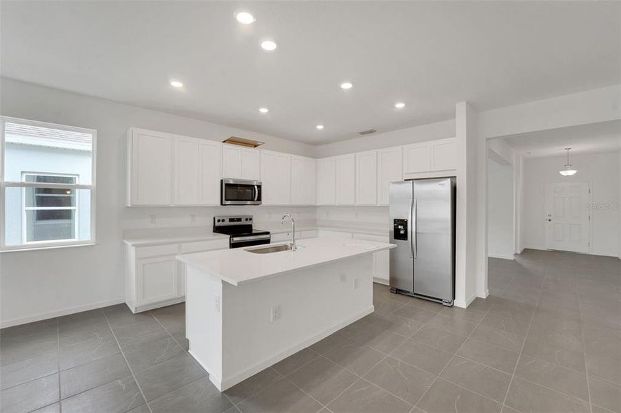 Furnished interior view inside a new home in Cypress Park Estates, Haines City (Image 3).