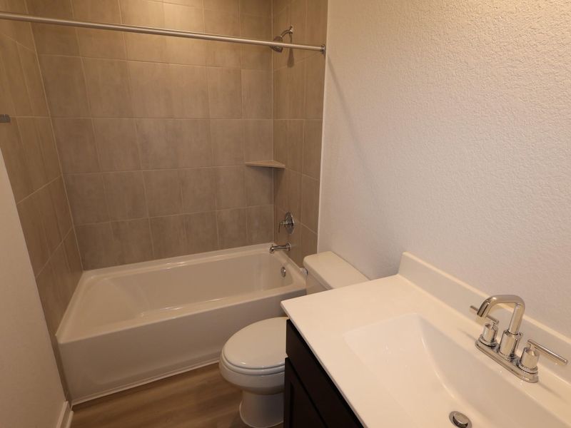 Furnished interior view inside a new home in Wildrye, Waller (Image 9).