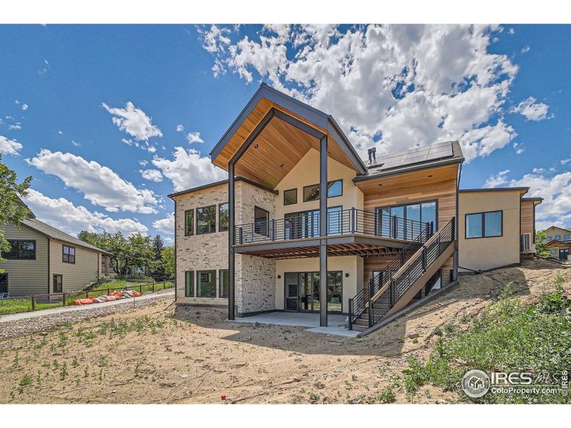Front exterior of a new home in , Louisville, CO, highlighting curb appeal (Image 2).