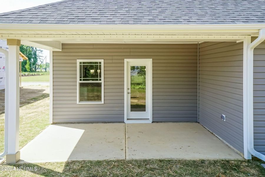 Front exterior of a new home in Waverly Place, Richlands, NC, highlighting curb appeal (Image 2). Front exterior of a new home in Waverly Place, Richlands, NC, highlighting curb appeal (Image 2).