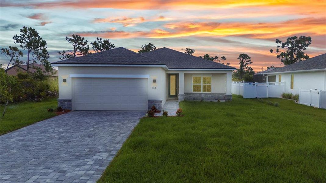 Front exterior of a new home in , Rotonda West, FL, highlighting curb appeal (Image 27). Front exterior of a new home in , Rotonda West, FL, highlighting curb appeal (Image 27).