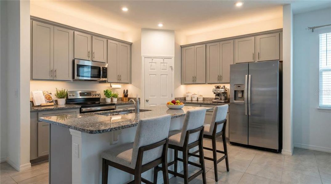 Furnished interior view inside a new home in Village at Windsor Reserve, Eagle Lake (Image 6).