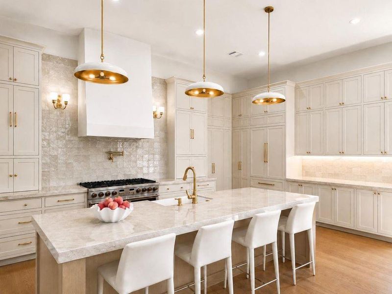 Chefs kitchen with quartzite countertops, hidden pantry, plastered vent hood, professional grade panel ready appliances and soft close cabinetry