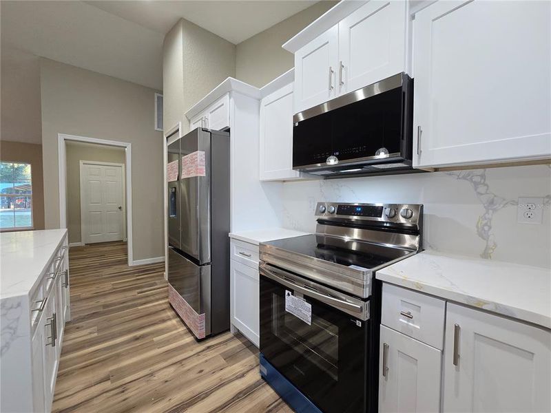 Furnished interior view inside a new home in , Ocala (Image 8).