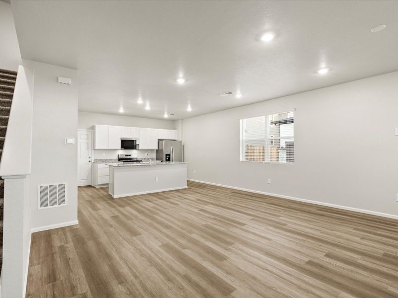 Spacious, unfurnished interior of a new home in Horizon Uptown: The Meadow Collection, Aurora (Image 9).