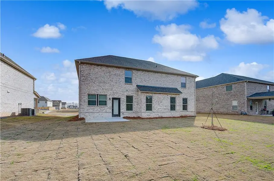 Exterior details and patio area of a home in Adagio, Dacula (Image 3).