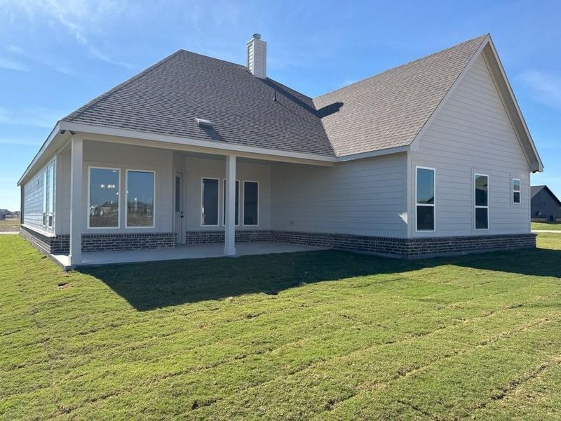 Exterior details and patio area of a home in Fairview Meadows, New Fairview (Image 3).