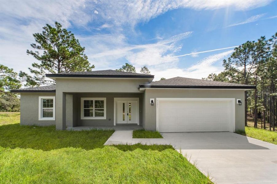 Front exterior of a new home in , Dunnellon, FL, highlighting curb appeal (Image 18). Front exterior of a new home in , Dunnellon, FL, highlighting curb appeal (Image 18).