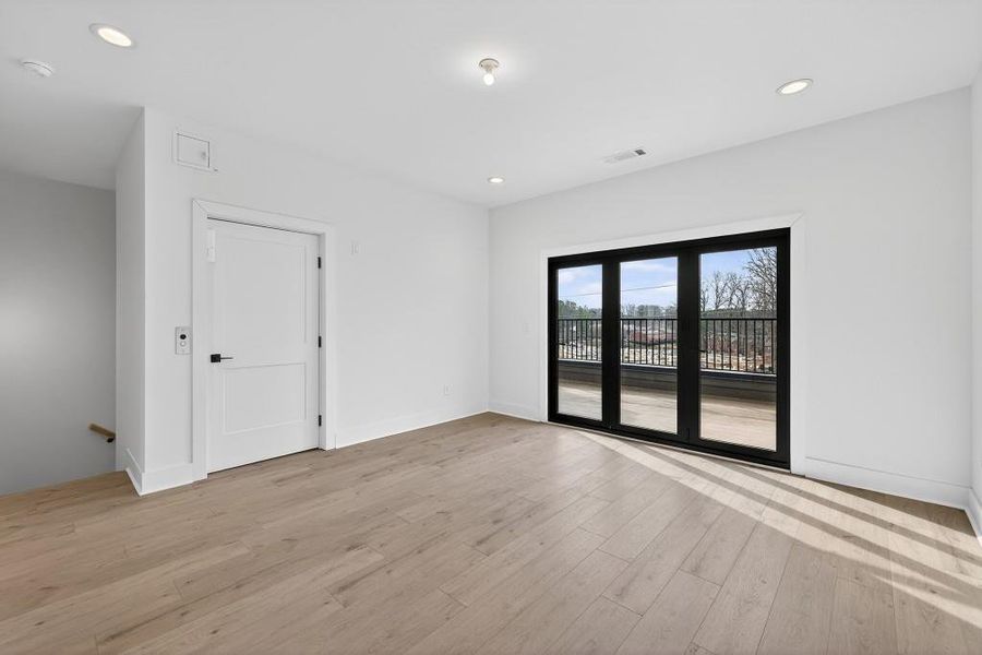 Spacious, unfurnished interior of a new home in Skyview On Broad, Sugar Hill (Image 26). Spacious, unfurnished interior of a new home in Skyview On Broad, Sugar Hill (Image 26).