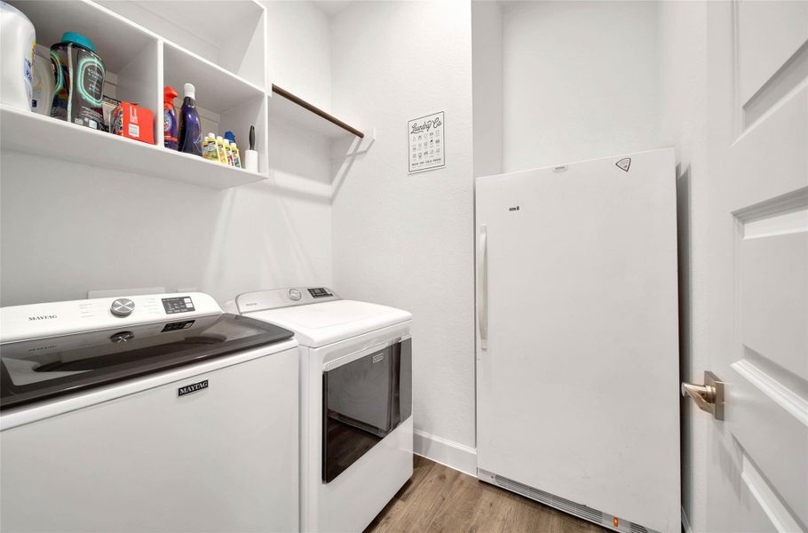The interior laundry room allows space for a second refrigerator or freezer, adding valuable storage & convenience.