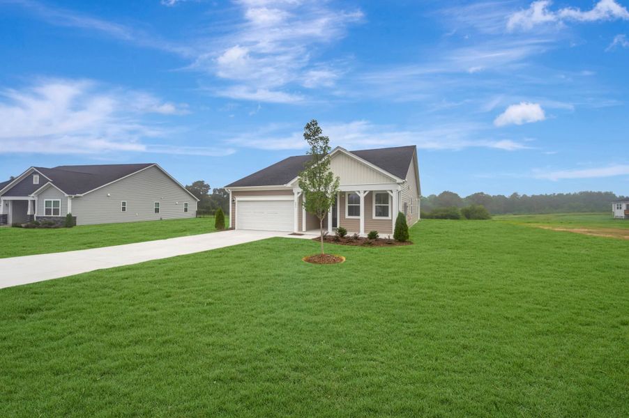 Front exterior of a new home in Fox Field Farms, Broadway, NC, highlighting curb appeal (Image 17).