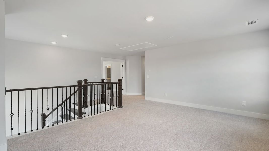 Representative furnished interior of a home built from the Stonefield - Finished Basement by DRB Homes in Pinebrook, Woodruff (Image 27).