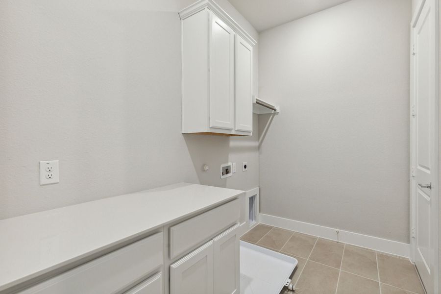 Furnished interior view inside a new home in Newman Village Townhomes, Frisco (Image 30).