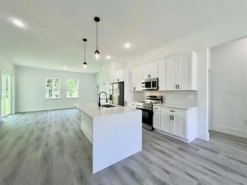 Furnished interior view inside a new home in , Ocala (Image 6).