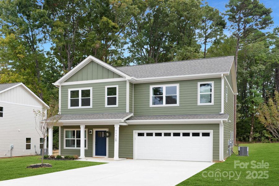 Front exterior of a new home in , Charlotte, NC, highlighting curb appeal (Image 2).